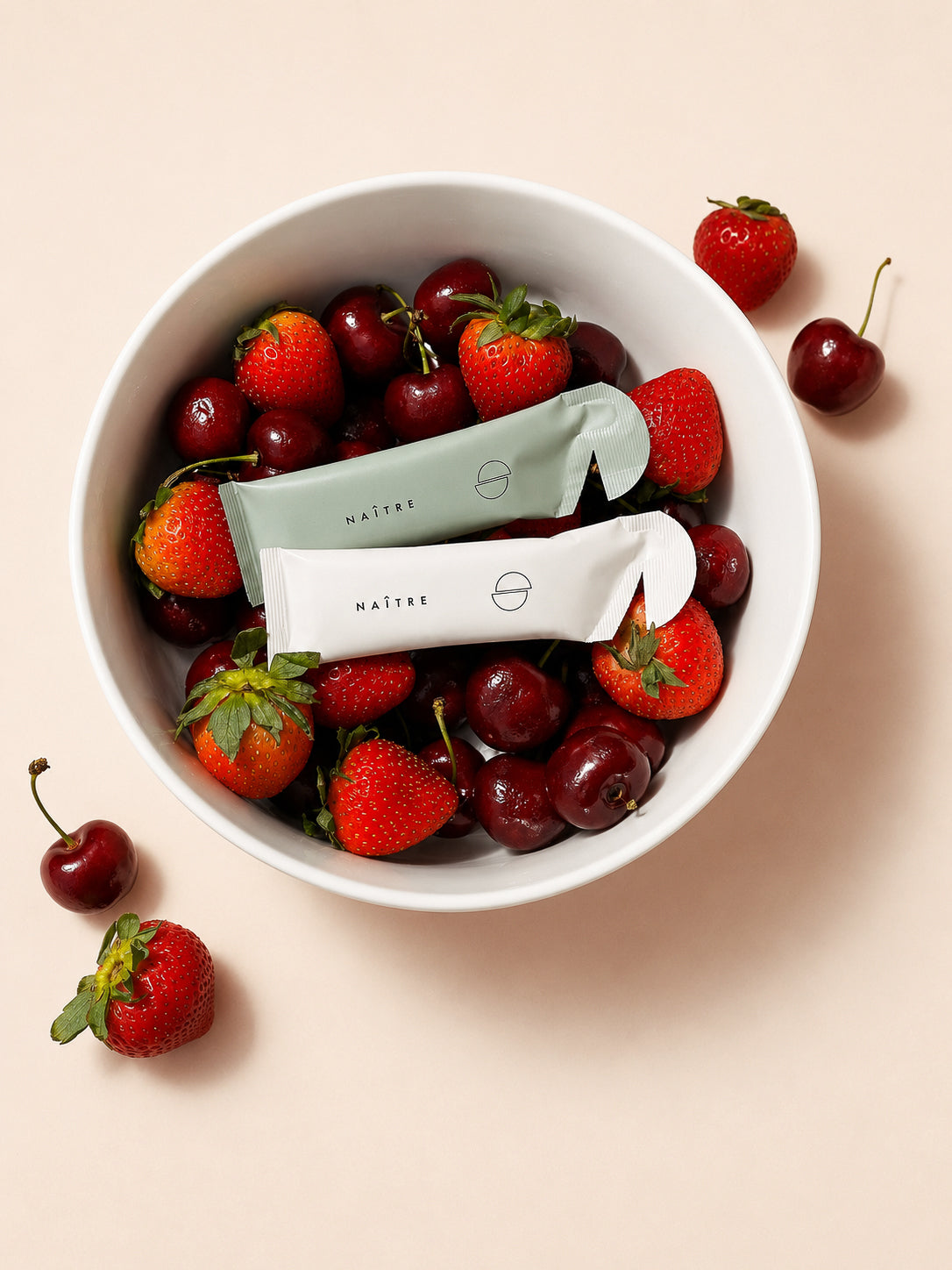Naître Women’s strawberry and Men’s cherry liquid fertility sachets